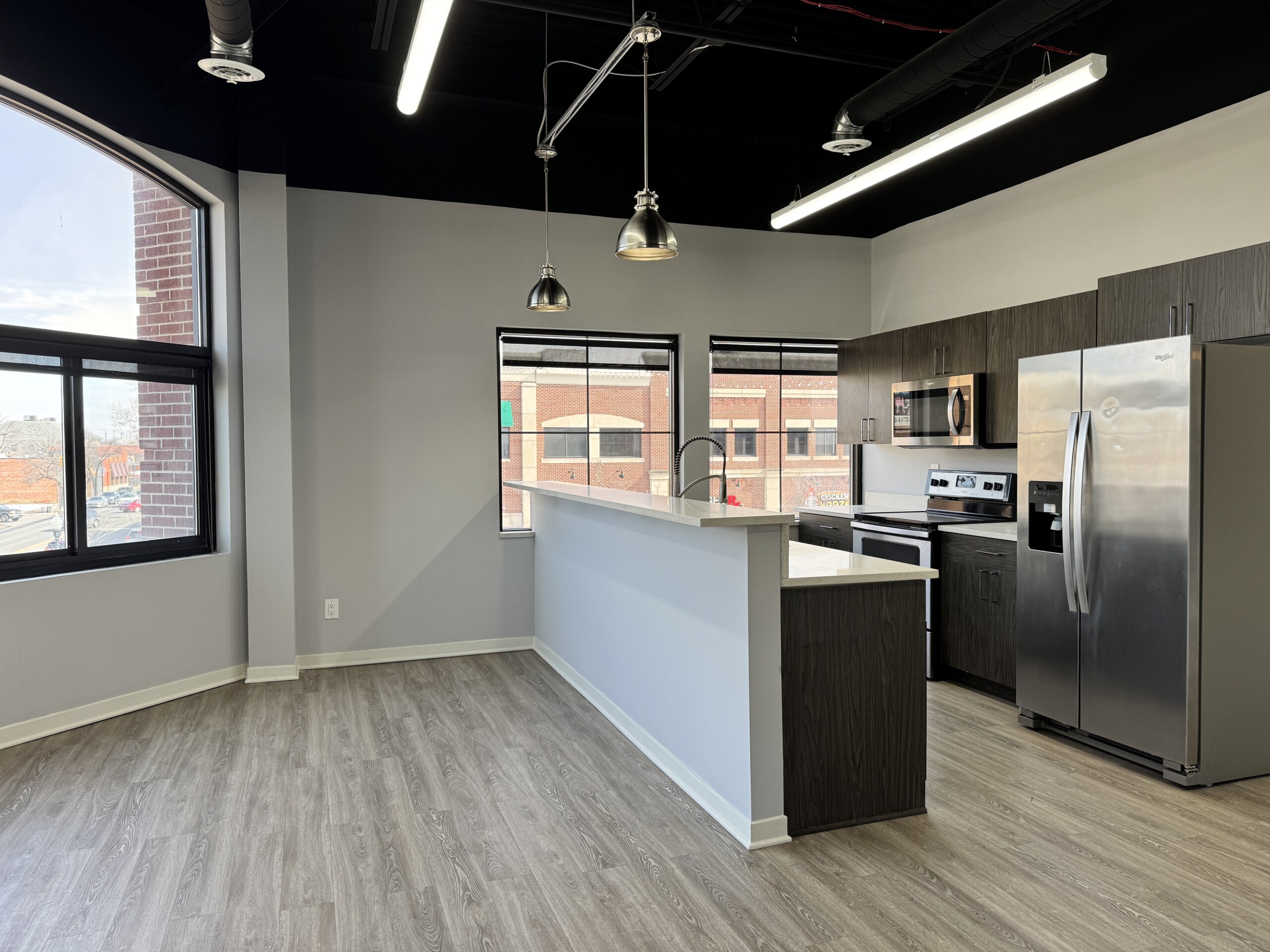 Modern loft-style apartment interior at Dearborn Lofts near Ford Motor Company